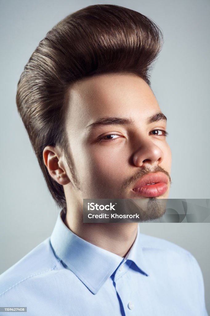 Portrait Of Young Man With Retro Classic Pompadour Hairstyle Stock Photo - Download Image Now - iStock Portrait Of Young Man With Retro Classic Pompadour Hairstyle Stock Photo - Download Image Now - iStock