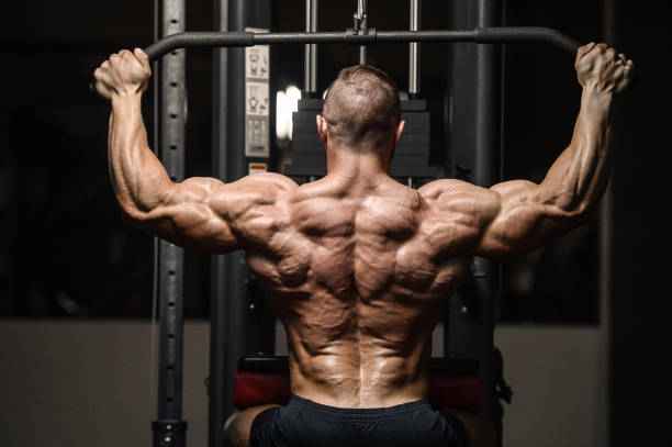 istock athletic men workout with ball fitness exercises 1159627432