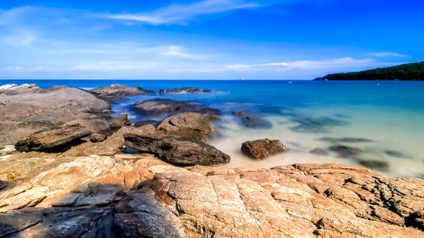 istock Rocks on the beach, Landscape with blue sea and Blue sky 1159627617