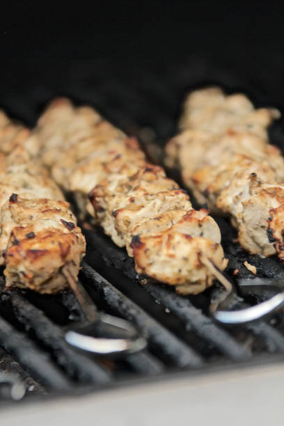 istock Chicken Skewers on the Barbecue 1159628810