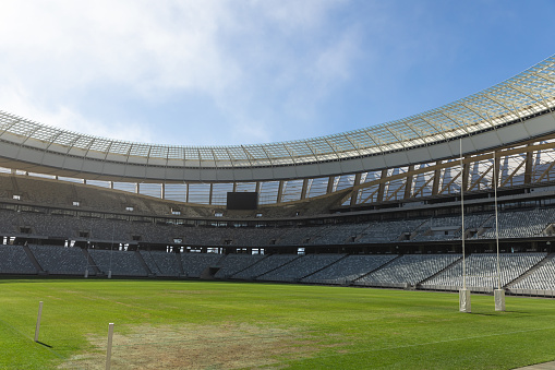 Loftus Versveld Stadium in Pretoria, home of the Blue Bulls Rugby Club with Pretoria cityscape panorama in the background.
