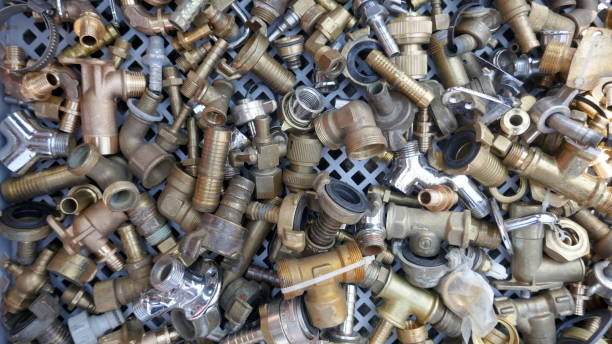 istock Small material for plumbers and heating installers. Copper, brass, steel, pipes, angles. 1159631965