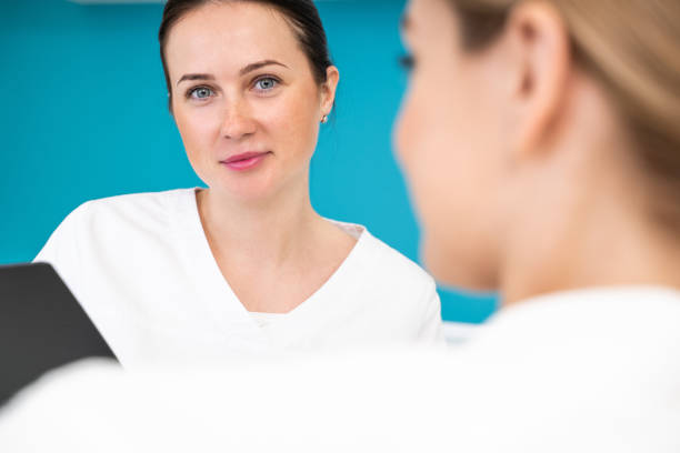 istock Selective focus of a medical worker looking calm and friendly 1159632187