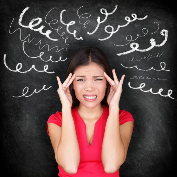 istock Stress - woman stressed with headache 1159637391