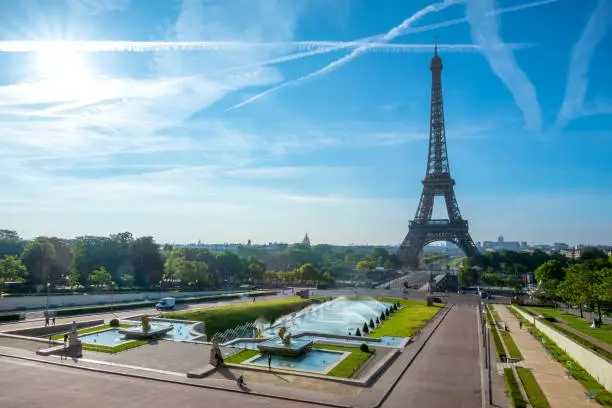 France. Paris. Day. The Eiffel Tower and the Trocadero gardens. Blue sky and clouds