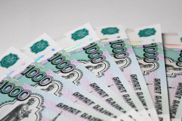 Russian banknotes in denominations of one thousand rubles.