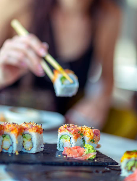 istock Eating sushi in the restaurant 1159640191