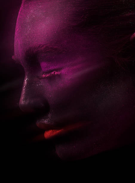 Model with purple face and red lips