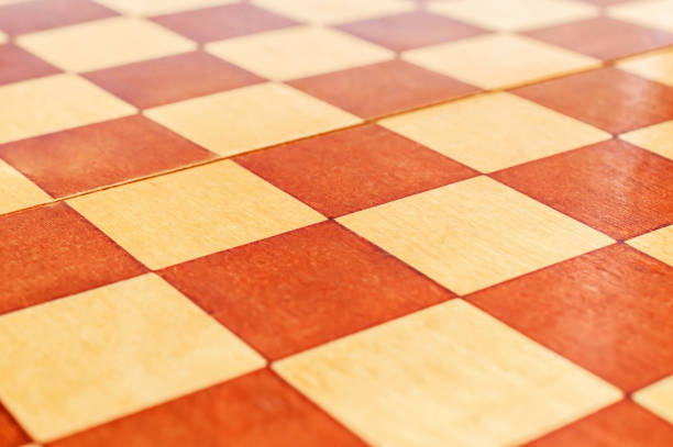 istock Wooden chess board as abstract background. Close up. 1159641392