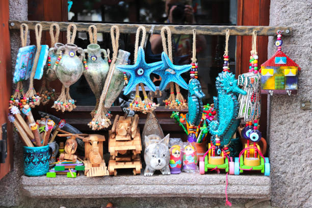 Traditional turkish souvenirs - ceramics starfish and seahorse, clay pot, wooden toy, glass evil eye charms,Turkey