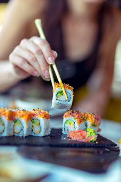 istock Eating sushi in the restaurant 1159641996