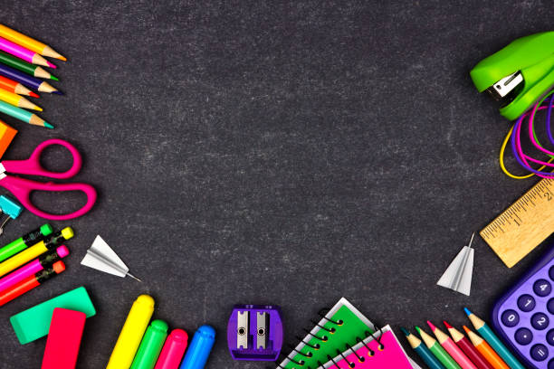 istock School supplies border frame, top view on a chalkboard background with copy space. Back to school. 1159642630