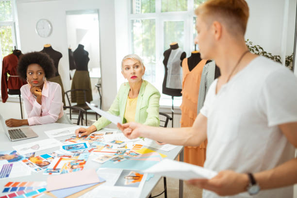 istock Women sitting at the table in a studio 1159644728