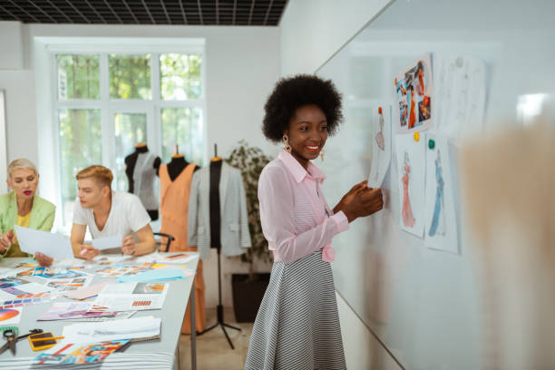 istock African American fashion designer standing in a studio 1159644748