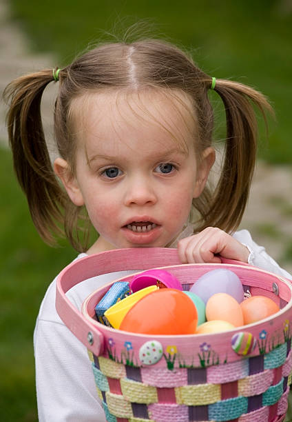 Girl with Easter eggs stock photo