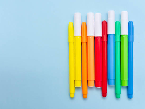istock Colorful markers isolated on light blue background, copy space for text. 1159651745