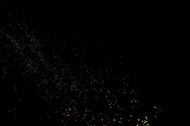istock Golden abstract bokeh on black background. 1159655646