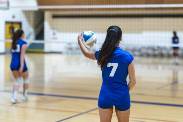 istock High school volleyball match 1159659057