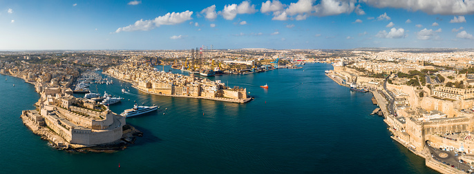Malta. Panorama of beautiful bay with cities. Valletta, Kalkara, Birgu, Senglea waterfront from above. Maltese cityscape.