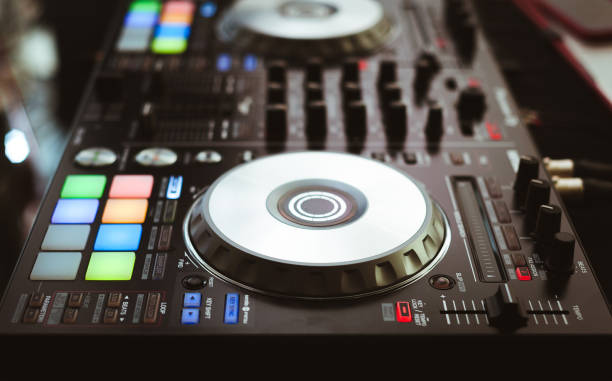 istock DJ plays and mix music on digital midi controller 1159661260