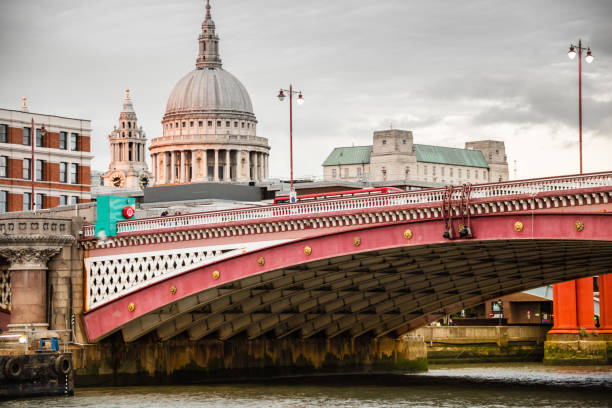 istock St Paul`s cathedral in London and thames river at sunset 1159664257