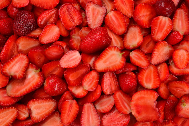 istock Strawberry slices. Fresh berries macro. Fruit background. Top view. 1159664910