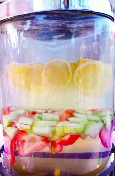 Photo of Limon, Cucumber, Strawberries in water with bubbles