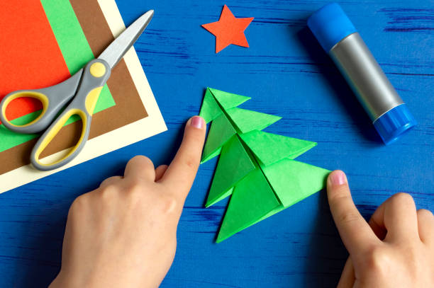 istock How to make Christmas card with Christmas tree. Step 7 1159669819