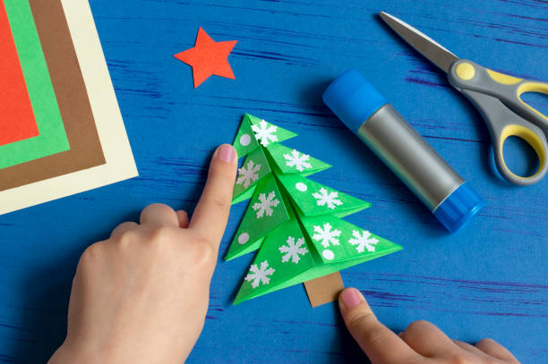 istock How to make Christmas card with Christmas tree. Step 10 1159669820