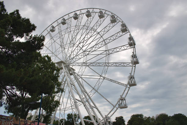 istock big white ferris wheel in the park 1159670923