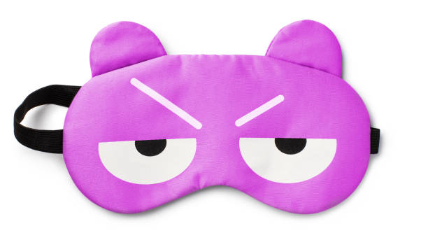 istock Purple sleeping eye mask on white 1159671417