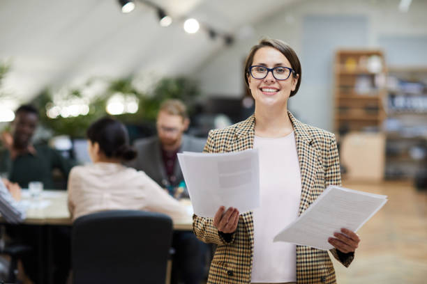 istock Smiling Businesswoman Posing in Office 1159672563