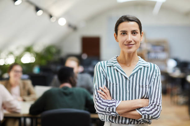istock Modern Businesswoman Posing in Office 1159672564