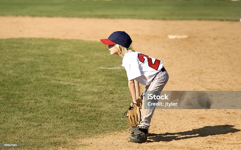 First Baseman A Little Leaguer playing first base. Baseball - Sport Stock Photo