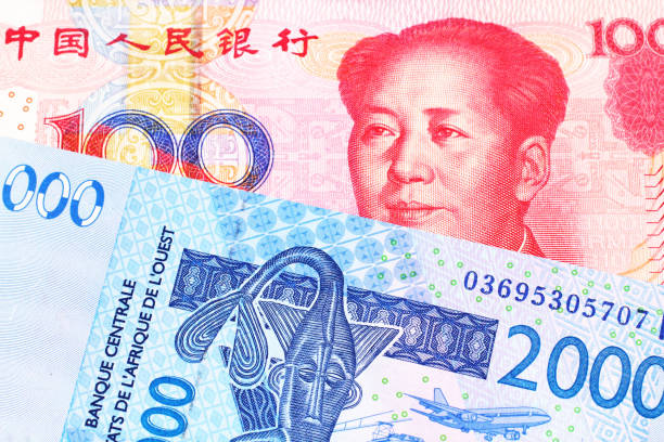 istock A Chinese one hundred yuan note with West African franc bill 1159675710