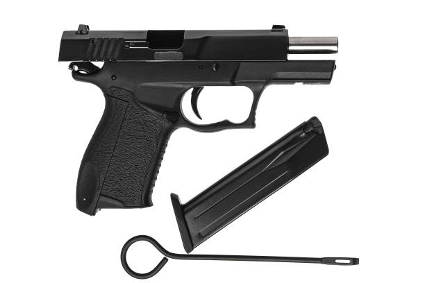istock Black gun pistol isolated on white background 1159675759