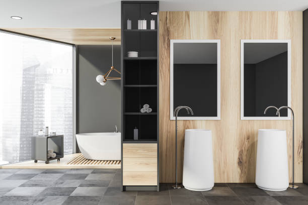 istock Wooden bathroom interior with sinks and tub 1159677646