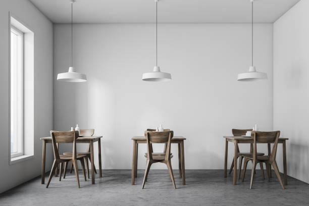 istock Interior of minimalistic white cafe 1159678512