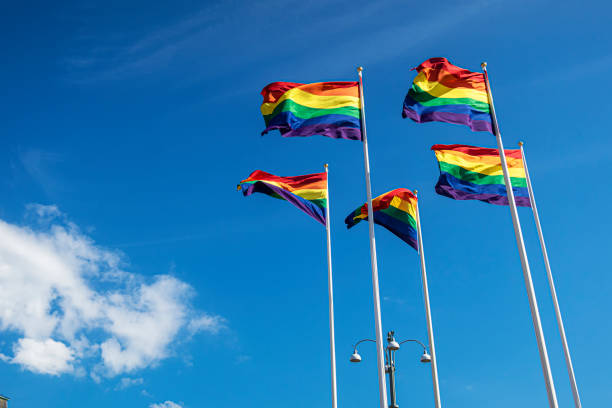 orgulho das bandeiras - symbols of peace flag gay pride flag banner - fotografias e filmes do acervo