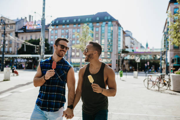 istock Gay couple eating ice-cream 1159681987