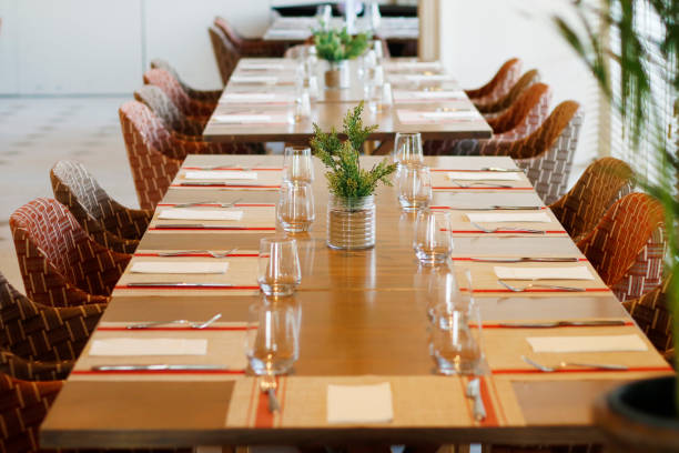 istock casual restaurant dining table set up, with dark brown color them 1159682211