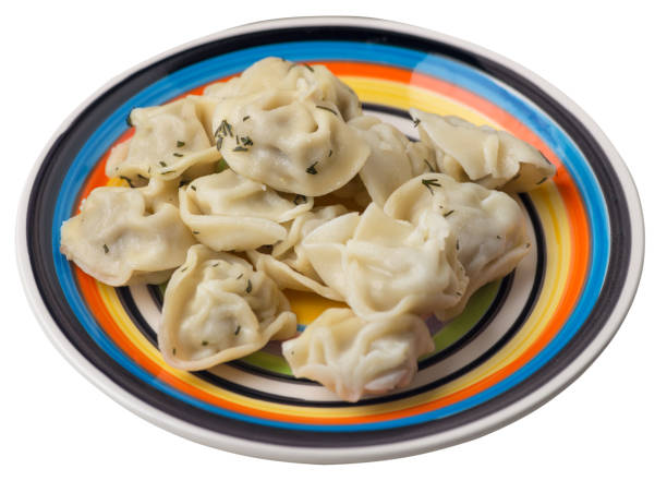 istock dumplings on a plate isolated on white background .meat dumplings top view . 1159684466