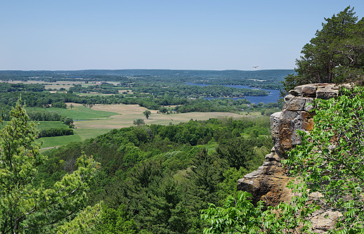 A sweeping view opens at the top of a hiking trail in southern Wisconsin.