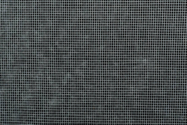 istock protective plastic mesh with small cells, close-up abstraction background 1159690588