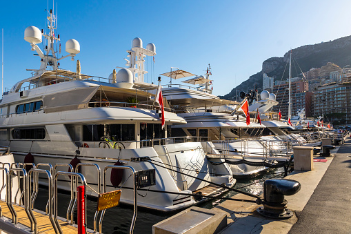 Monaco - June 24, 2018: Superyachts seen in Yacht Club de Monaco Marina in Monaco