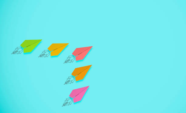 istock 3d rendering colorful paper airplane. competition concept 1159692810