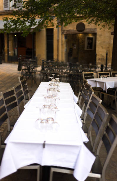 istock Aix-en-Provence, France: Long Table with White Tablecloth at Dusk 1159692983