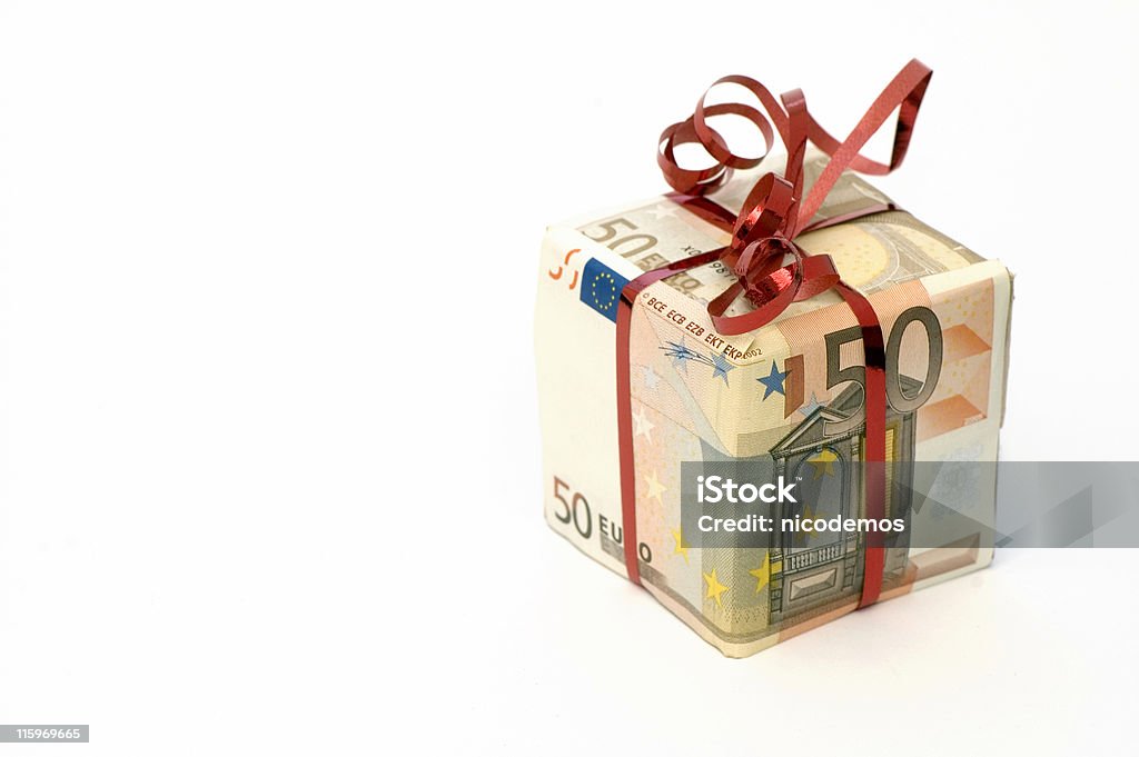 Present in Euro Present wrapped in euro bills. Isolated on white. Currency Stock Photo