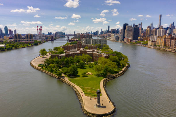 Aerial drone photo Roosevelt Island Lighthouse Aerial drone photo Roosevelt Island Lighthouse roosevelt island stock pictures, royalty-free photos & images