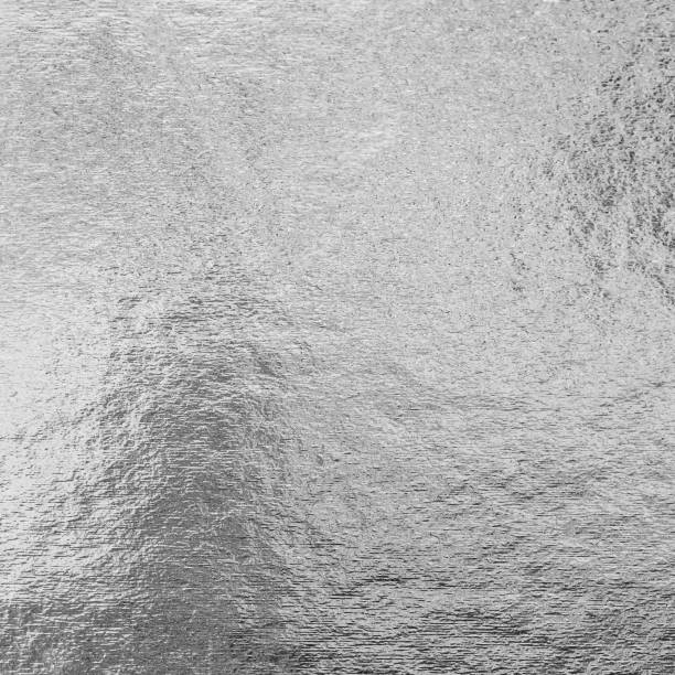 istock Silver foil shiny metal texture background wrapping paper for wallpaper decoration element 1159700052